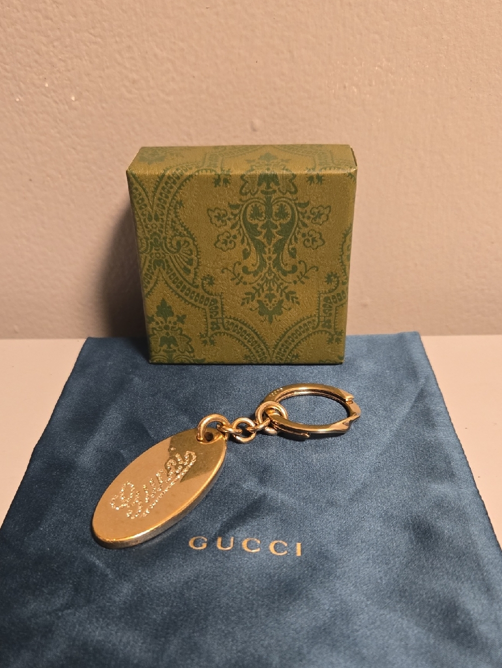 Gucci Gold Oval Logo Keyring